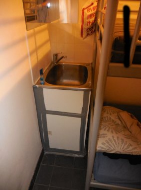 A bunk bed in a laundry of an illegal accommodation in the Sydney CBD.