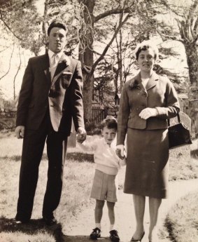 In his shadow: Cumming (centre) as a young boy with his parents Alex and Mary. 