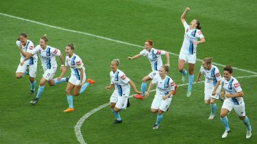 Top of their game: Melbourne City celebrate their penalty shoot-out victory over Brisbane Roar.