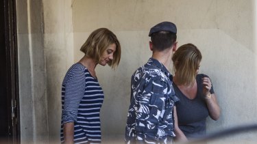 Tara Brown, left, and Australian mother Sally Faulkner, right, leave a women's prison in the Beirut suburb of Baabda.