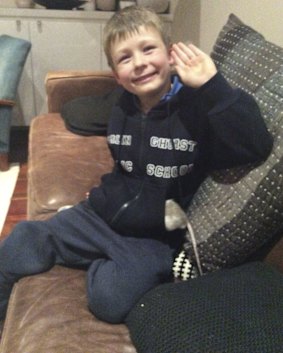 Tanya Plibersek's son Louis with the rat he and his siblings named Harry. 