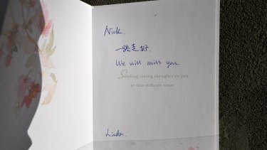 A card for the Brighton terror victim left outside the apartment block where he was killed.