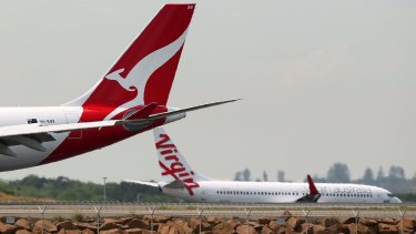 Qantas's move comes after Virgin eliminated fuel surcharge references last week and lowered its base fares to the United States.
