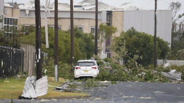 The road into Kurnell is strewn with fallen trees.