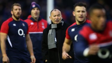 New approach: Eddie Jones watches over the England pre-match warm-up during the Six Nations match against Scotland.