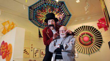 Master kite designer and internationally known artist Peter Travis with MC Maximus the Magnificent at the launch of "Wind Air Water – Kites" at Lake Ginninderra in Canberra in 2012.