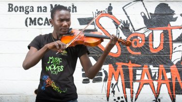 The violin keeps 18-year-old Julius occupied.