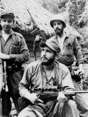 Fidel Castro pictured in 1957 with his brother Raul (left) and Camilo Cienfuegos (right), while operating in the mountains of eastern Cuba.