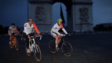 On Tour de France ground: Prime Minister Tony Abbott cycles in Paris. 