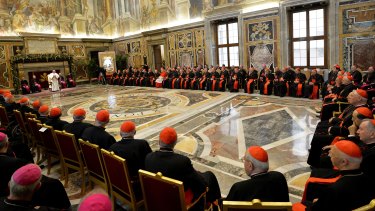 Pope Francis delivers his message during his meeting with Cardinals and Bishops of the Vatican Curia.