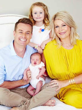 Grant Denyer and his family as they appear in the new issue of Woman's Day.