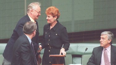 Pauline Hanson is congratulated after her maiden speech by fellow Independents.
