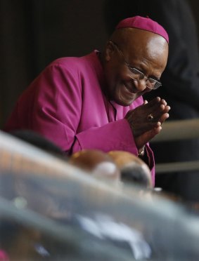 Retired Anglican Archbishop Desmond Tutu  as he arrives for the memorial service for former South African president Nelson Mandela at the FNB Stadium in Soweto, near Johannesburg, in 2013.