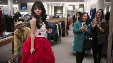 Anastasia Lin, the reigning Miss Canada, tries on her Miss World pageant dress in Toronto.