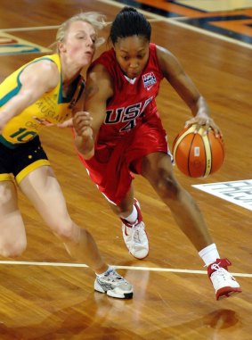 Cappie Pondexter rounds Australian Opals' Samantha Richards back in 2006.