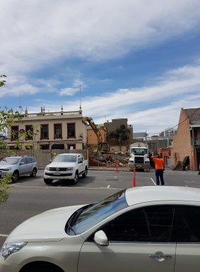 Shaq Demolition midway through knocking down the pub. 