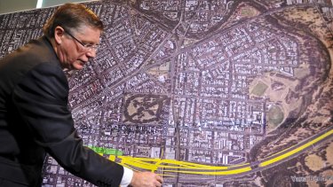 Denis Napthine revealing details of the East West Link last year.