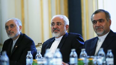 Iranian Foreign Minister Mohammad Javad Zarif, centre, with the head of his country's nuclear organisation, Ali Akbar Salehi, left, and Hossein Fereydoon, brother and close aide to President Hassan Rouhani at the Vienna talks.