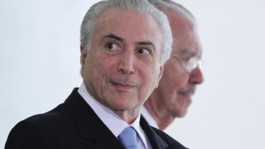 Embattled Brazilian President Michel Temer, front, next to former president Jose Sarney on Wednesday.