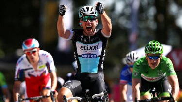 Mark Cavendish (Etixx-Quick Step) of Great Britain celebrates his victory following the sprint finish during the 190.5km-stage seven of the Tour de France.