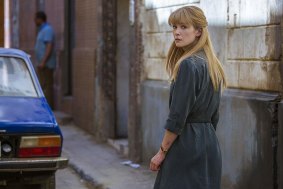 Rosamund Pike redeploys her poker face as a CIA agent in Beirut.