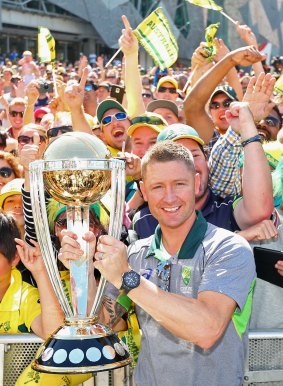 Michael Clarke celebrates with fans at Federation Square in Melbourne.