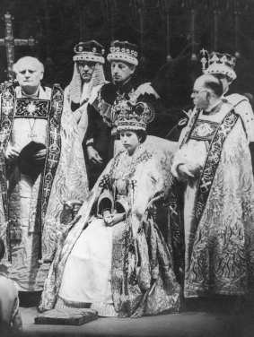 Queen Elizabeth II prepares to receive homage after her coronation ceremony in Westminster Abbey on June 2, 1953.
