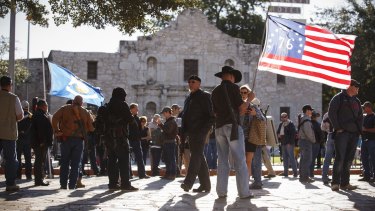 Demonstrators, some with rifles, gather at a gun rally San Antonio, Texas, last month.