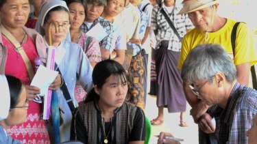 Myanmar Australia Conolly Foundation. November 2015. Queue at the MACF temporary clinic in the hill village of Leik Tho, Myanmar. Dr Raymond Wong sees a patient. Photo: Dr Tim Peltz.