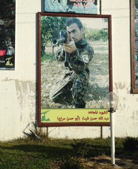 A memorial to Hezbollah fighter Abdullah Hassan Sheet on the Blue Line, the de facto boundary between Lebanon and Israel demarcated by the United Nations.