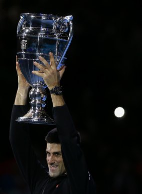 Djokovic with the 2014 ATP World Tour No.1 Award trophy.