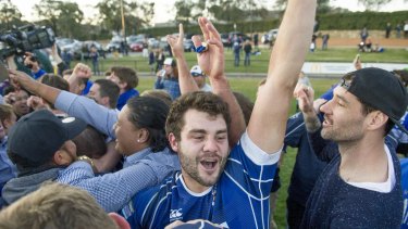 Canberra Royals player Ben Johnston celebrates after the grand final last season. The Royals will play Queanbeyan on Saturday,  and the match will be streamed on the internet.