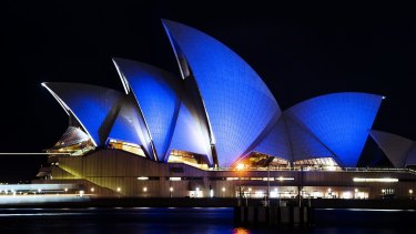 The Sydney Opera House is lit blue on April 2, 2015, on the United Nations' World Autism Awareness Day. 