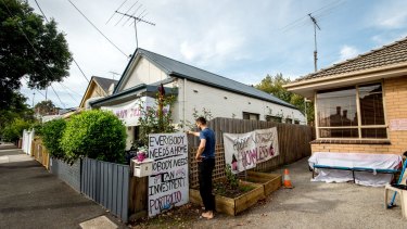 A homeless person in front of the Bendigo Street, Collingwood, house that has been occupied. The government-owned house had sat vacant for more than a year. 