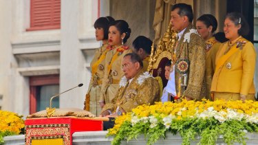 Thailand's King Bhumibol Adulyadej with his family on his 85th birthday.