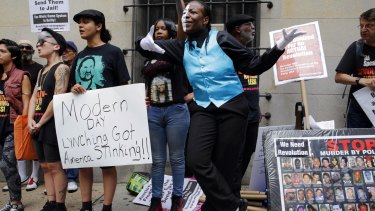 Protesters outside a courthouse after Officer Caesar Goodson was acquitted of Freddie Gray's murder.