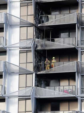 Firefighters at the scene of the Lacrosse fire in November 2014.