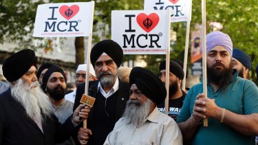 Members of the Manchester Sikh Community attend a vigil in Albert Square, Manchester on Tuesday afternoon.
