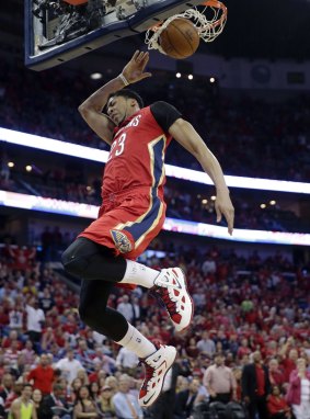 Highlight factory: New Orleans Pelicans forward Anthony Davis dunks during the first half against the San Antonio Spurs in New Orleans.