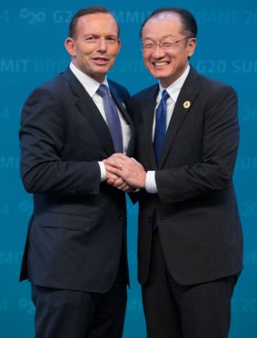 PM Tony Abbott greets World Bank Group president Jim Yong Kim.
