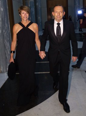 Breakfast with Prime Minister Tony Abbott, pictured with wife Margie at last year's ball, fetched $10,707.