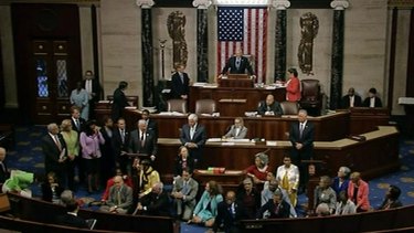 Georgia Representative John Lewis, centre, leads a sit-in in the US Congress of more than 200 Democrats in demanding a vote on measures to expand background checks and block gun purchases by suspected terrorists.