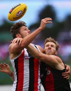 Jonathan Giles (right) challenges Tom Hickey of the Saints during a pre-season match in March.