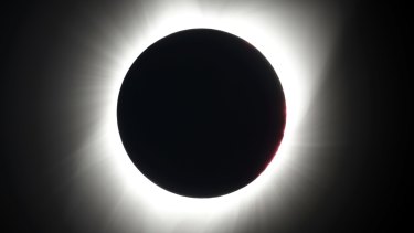 The moon covers the sun during the total eclipse.