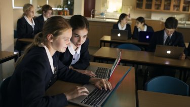 "A more hands-on, engaging way to learn": Claudia Wilson, 14, and Francesca Brown 13, at Redlands school in Cremorne. 