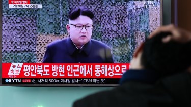 A man in Seoul, South Korea watches a broadcast of Kim Jong-un after North Korea's most recent ballistic missile test.