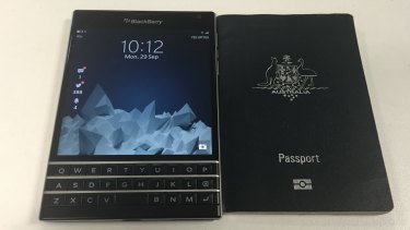 The Blackberry Passport next to an Australian passport.