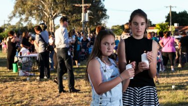 Grace and Laura McKinnon were among the mourners at the vigil for Zoe Buttigieg in Wangaratta on Tuesday evening.