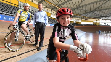 Gabi Forman on the track with cyclist Geoff Stoker and Cycling NSW's Phil Ayres.