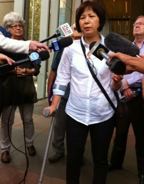 Hip implant recipient Sandy Chen outside the Federal Court.  